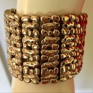 Gold toned elastic bracelet